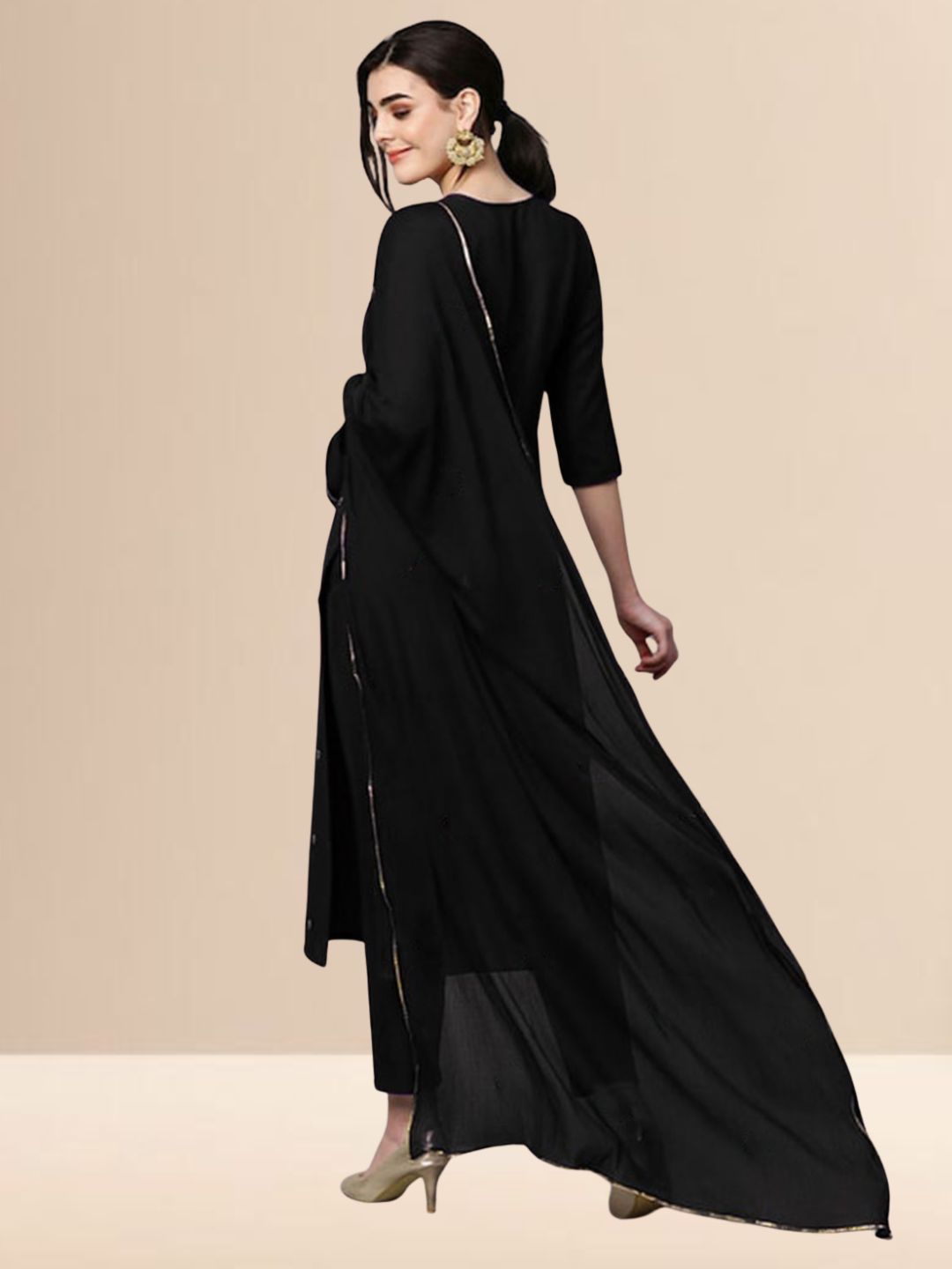 Woman wearing a black embroidered georgette kurta set with trousers and a dupatta, suitable for festive and daily wear.
