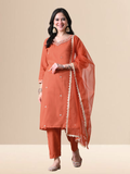 Woman wearing a rust orange Cotton blend kurta set with silver embroidery on the neck and sleeves, paired with trousers and an organza dupatta.