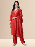 A woman wearing a red straight-cut cotton blend kurta with V-neck embroidery, matching trousers, and a red dupatta.