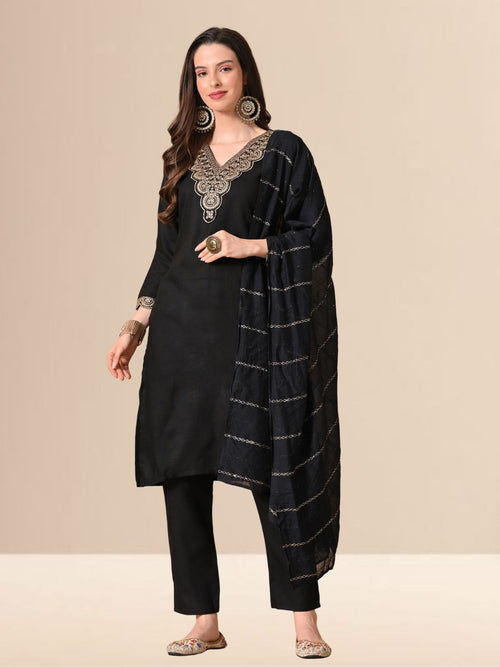 Woman wearing a black straight-cut cotton blend kurta with gold V-neck embroidery, matching trousers, and a black dupatta with gold stripes.