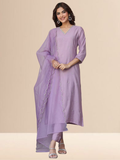 Woman wearing a lavender cotton blend kurta set with V-neck embroidery and a sheer scalloped edge dupatta.